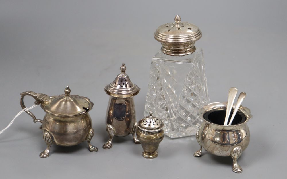 A modern silver three piece condiment set by Elkington & Co, one other silver condiment and silver topped shaker